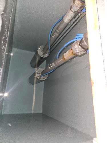 Cold water storage tank cleaning in progress at occupied student accommodation