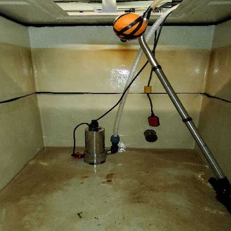 Cold water storage tank cleaning in progress at occupied student accommodation