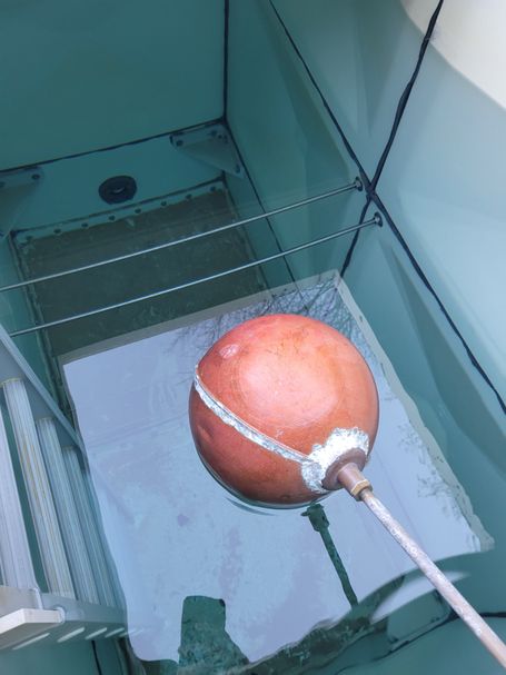 Sediment inside commercial cold water tank