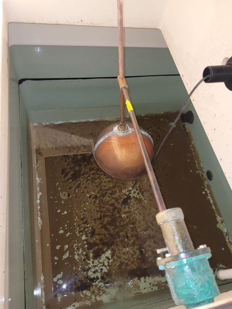 Before commercial water tank cleaning Greater Manchester