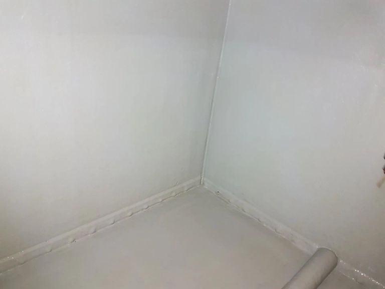 Before and after communal water tank cleaning in a Nottingham residential development