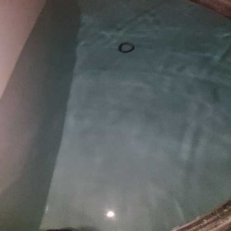 Cleaned and disinfected cold water storage tank at student accommodation building